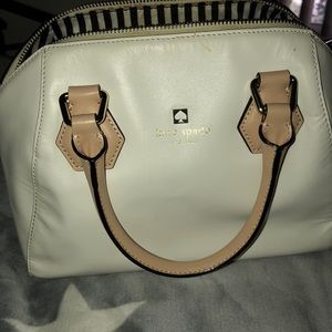 Cream and tan Kate Spade crossbody purse